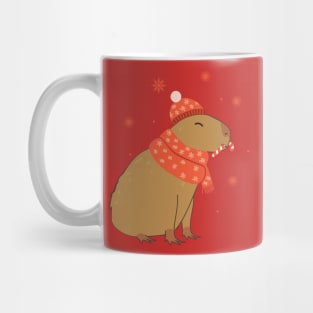 Christmas capybara in red scarf and hat Mug